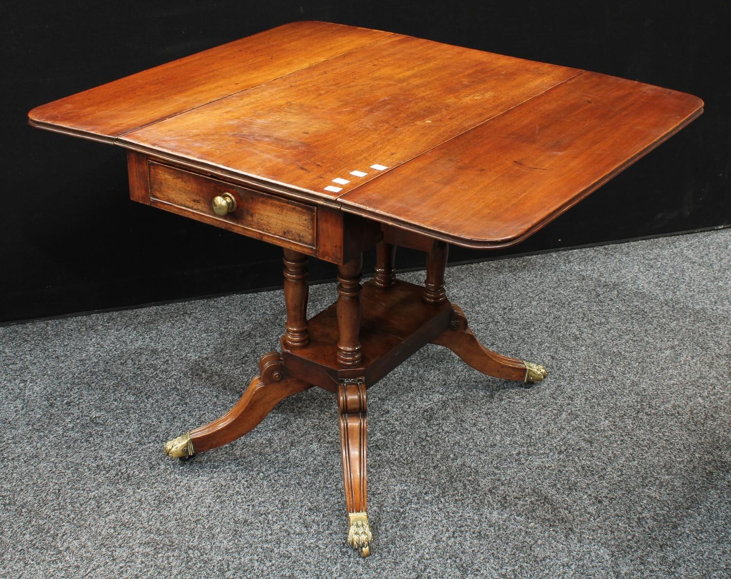 A Regency mahogany Pembroke table, rounded rectangular top with fall leaves, above a single frieze - Image 2 of 6
