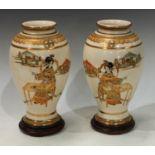 Two early 20th century Japanese Satsuma vases and stands
