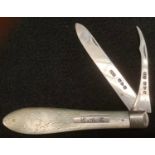 A late Victorian silver two blade fruit knife, folding knife and seed pick blades, engraved mother