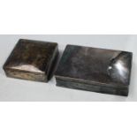 A silver square cigarette box, hinged cover, Birmingham 1921; a silver on copper cigarette box,