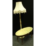An oval faux-onyx coffee table; an onyx standerd lamp (2)