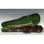 A 19th century German 3/4 size violin, the two-piece back 33.5cm long excluding button, outlined