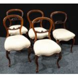 A set of three Victorian mahogany balloon back side chairs; another, pair, similar (5)