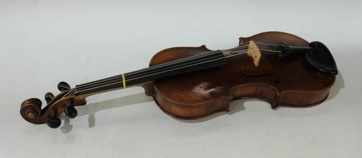 A 19th century German 3/4 size violin, the two-piece back 33.5cm long excluding button, outlined - Image 5 of 8