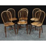 A set of six Country House elm stick back side chairs (6)