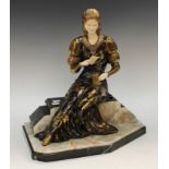 An Art Deco figure, seated lady in black and gold dress, after Cipriani, 37cm high (restored)