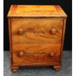 A George III style walnut side cabinet, as a chest of two long drawers, the top and front hinged