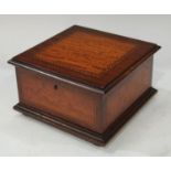 An Edwardian satinwood and mahogany jewel box, hinged cover enclosing a lift-out tray lined with