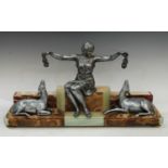 An Art Deco spelter group, seated lady with two deer, (arm restored)