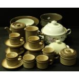 A Denby Sonnet pattern tea set for six, teapot, cream jug, milk and sugar, cups and saucers; a Denby