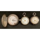 An 800 grade silver hunter cased pocket watch, 800 PDA, ornate case; others smaller 935 grade silver