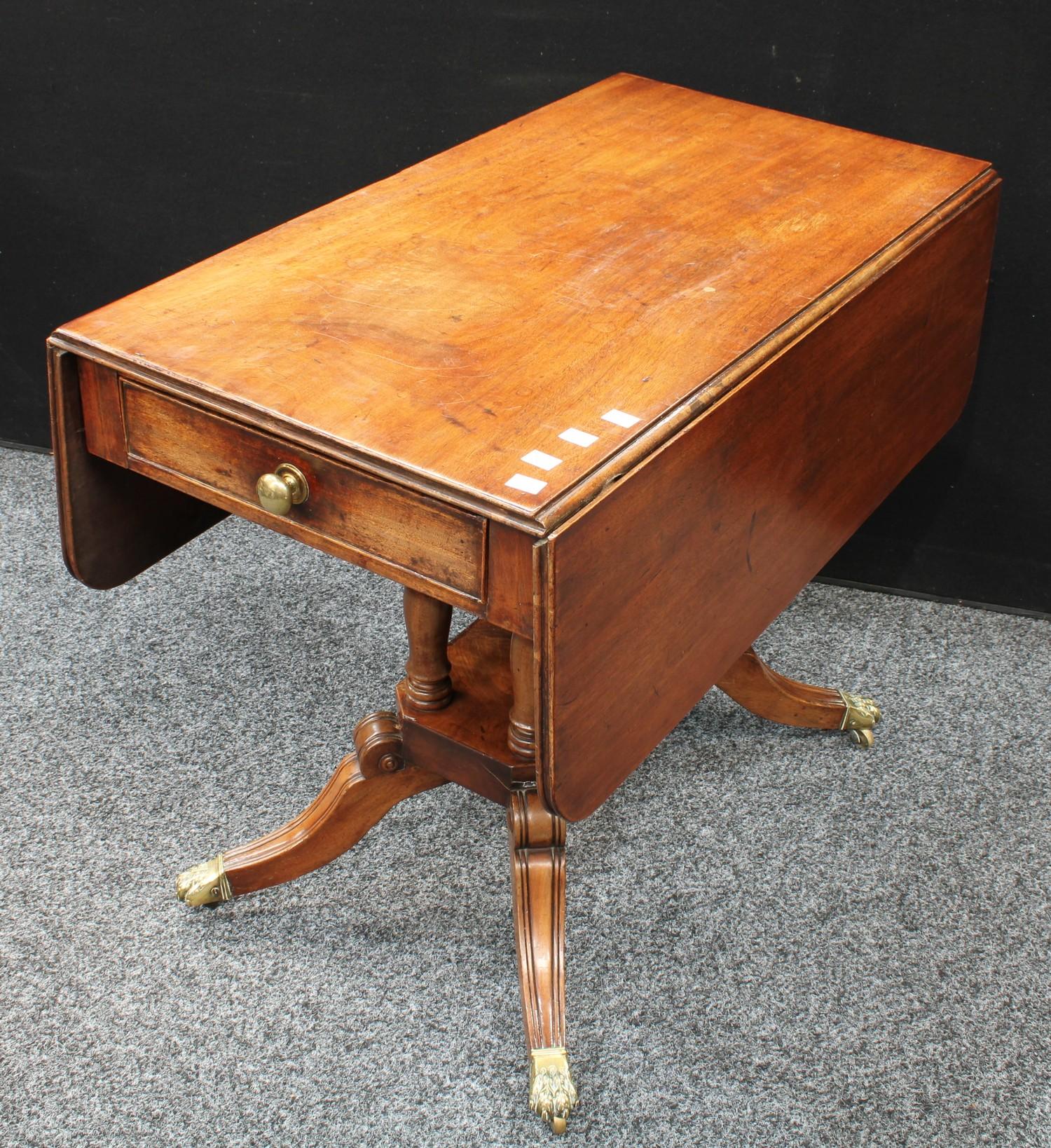 A Regency mahogany Pembroke table, rounded rectangular top with fall leaves, above a single frieze - Image 6 of 6