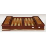 A Franklin Mint Excalibur backgammon set, with pamplets, missing two pieces