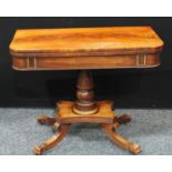 A Regency mahogany card table, folding rectangular top enclosing a baize lined playing surface,