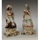 A pair of 19th century figures, of a gallant and companion, he as a cavalier, both seated, high
