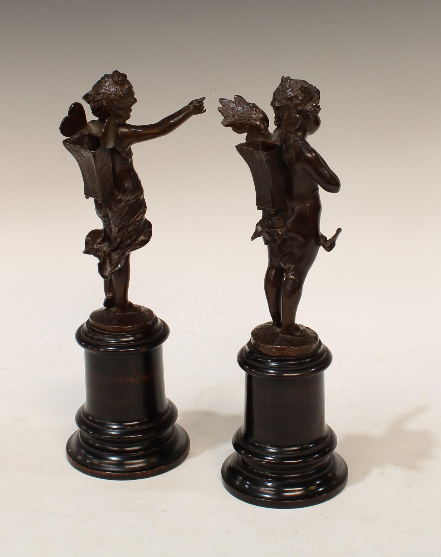 A pair of 19th century bronze figural spill vases, standing with arm raised, high ebonised - Image 2 of 2