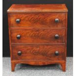 A George III mahogany chest, of small proportions, slightly oversailing crossbanded rectangular