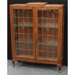 A early 20th century oak lead-glazed bookcase,116cm high. c.1930