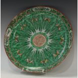 A large Chinese famille verte porcelain circular charger, centred by the Shou character of longevity