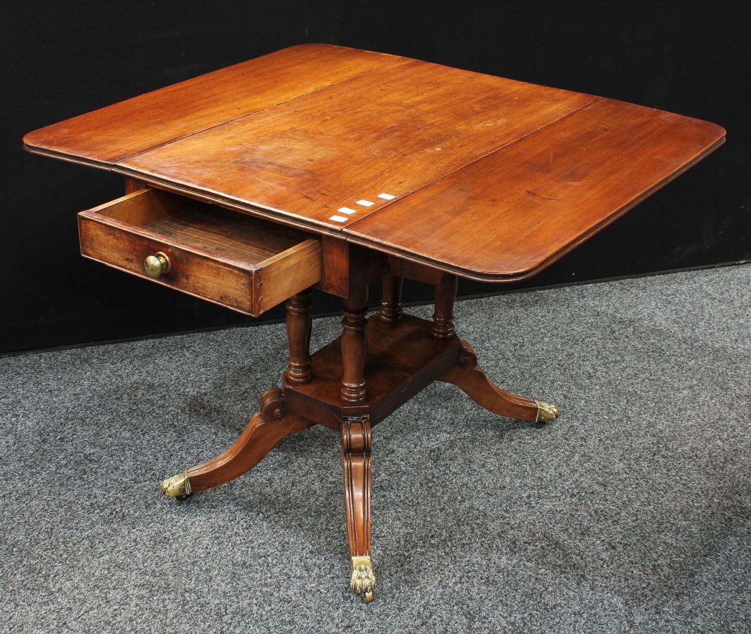 A Regency mahogany Pembroke table, rounded rectangular top with fall leaves, above a single frieze - Image 3 of 6
