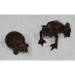 A miniature bronze, of a hedgehog; another, of a frog (2)