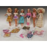 A collection of 1970?s and 1980?s Sindy dolls, various, each wearing different outfits; a quantity