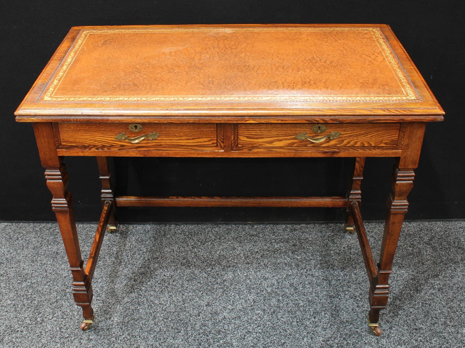 An early 20th century oak writing desk, in the manner of Gillow & Co, moulded rectangular top with - Image 2 of 3