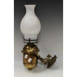 Maritime interest - an early 20th century brass ships bulkhead/wall mounted oil lamp, gimballed