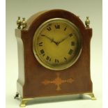 An Edwardian mahogany inlaid mantel clock