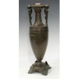 A 19th century Grecian Revival brown patinated bronze table lamp, of loutrophoros form, figural