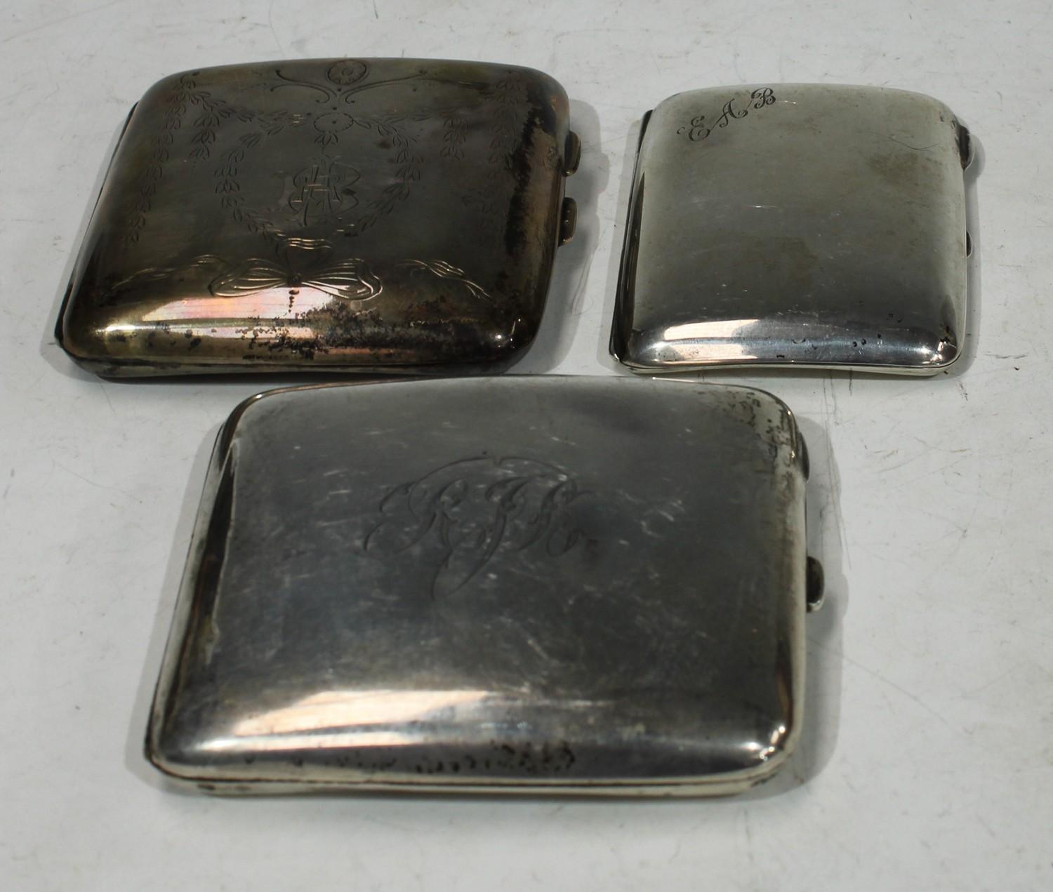 A silver cigarette case, Chester 1917; another, gilded interior, Chester 1908; another, Chester