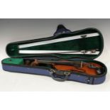 A 19th century German violin, Guarnerious copy, the two-piece back 35cm long excluding button,