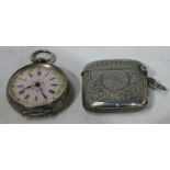 A French silver lady's open face pocket watch, marked 935; a silver vesta case, Birmingham, marks