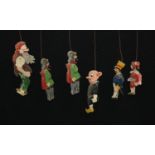 Six Continental wooden puppets, painted in colours, c.1920