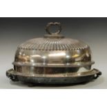 A large silver plated meat cover and stand, 58cm wide