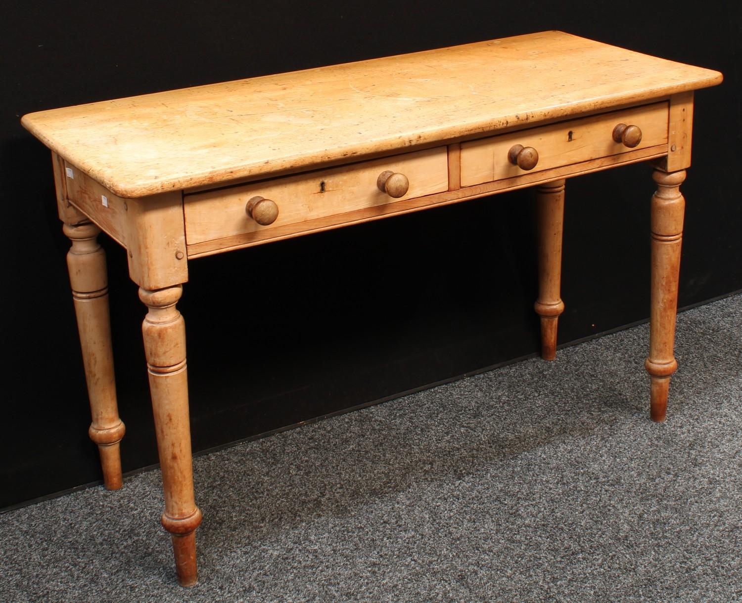 A Country House serving table, rounded rectangular top above a pair of frieze drawers, 122cm wide