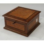 An Edwardian burr and figured walnut cigar box, outlined throughout with ebony stringing, hinged