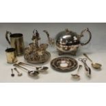 A pair of silver serving spoons, Sheffield, 1939; an electroplated globular teapot, an egg stand,