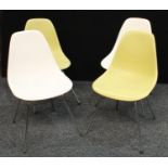 A pair of Ray and Charles Eames Design plastic Vitara chairs, GSX, in lime green; another pair in
