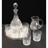 An Edinburgh crystal cut glass decanter, second quality, six whisky glasses, a water jug, a circular