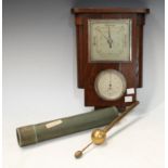 A brass hydrometer, cardboard cylinder; an oak cased aneriod wall barometer (2)