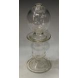 A clear glass lace maker's lamp, 29cm