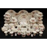 A Royal Crown Derby Posie pattern teapot, milk and sugar, teacups and saucers, teaplates, sandwich