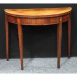 A George III mahogany demilune card table, hinged crossbanded top enclosing an inset baize lined