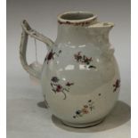 An 18th century Chinese chocolate pot, for the continental market, decorated with foliate sprigs