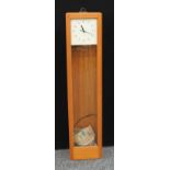 A mid 20th century Gent Pul-syn-etic wall clock, white dial, Arabic numerals, glazed single door