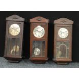 An oak cased west minster chiming wall clock, silvered dial, Arabic numerals, 78cm high; others (3)
