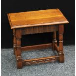 A 17th century style oak joint stool.