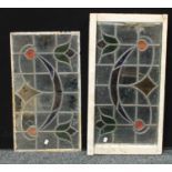 A pair of Art Nouveau stained glass panels