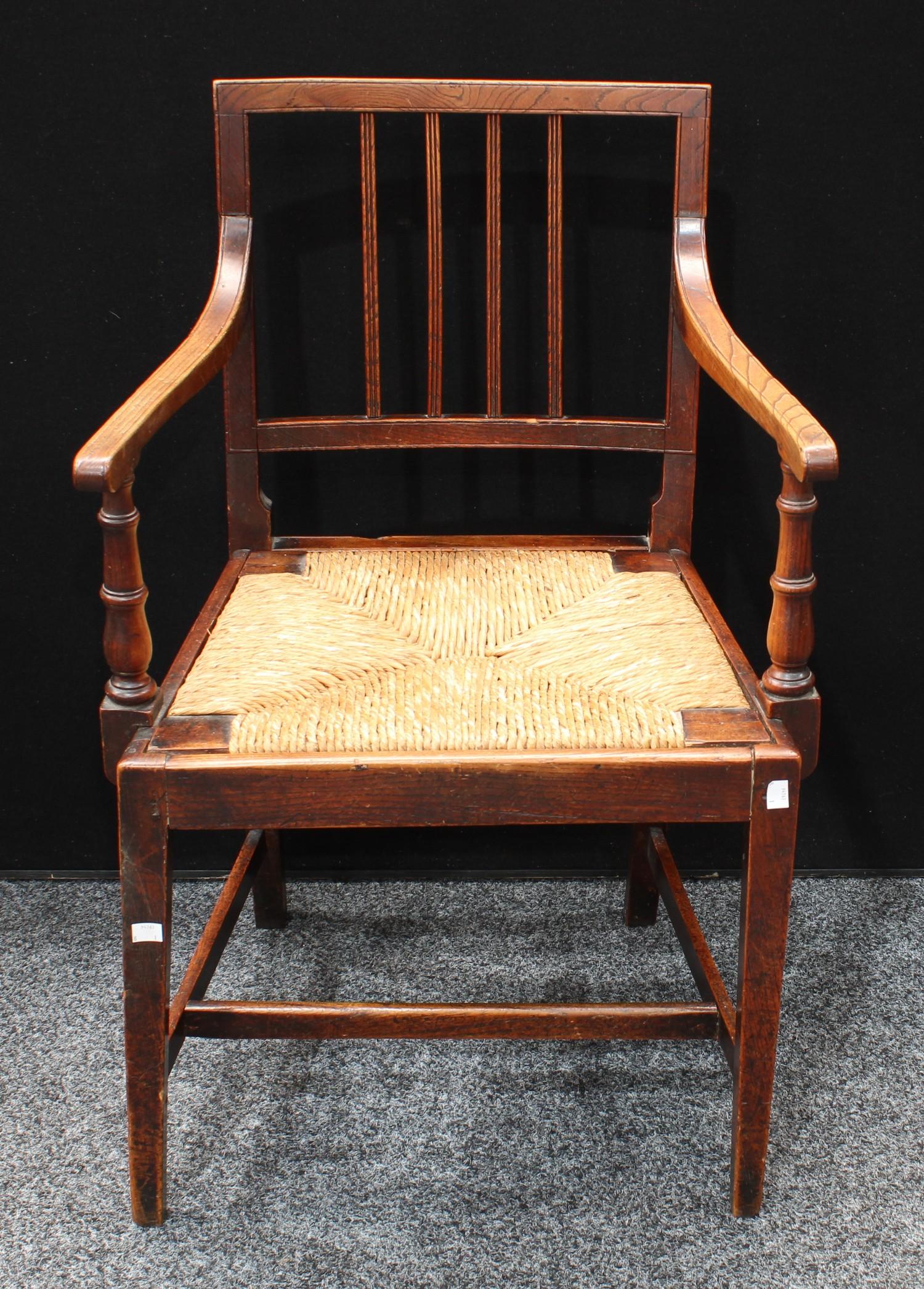 A 'George III' Country House elm and mahogany open armchair, drop-in rush seat, tapered square legs, - Image 2 of 2